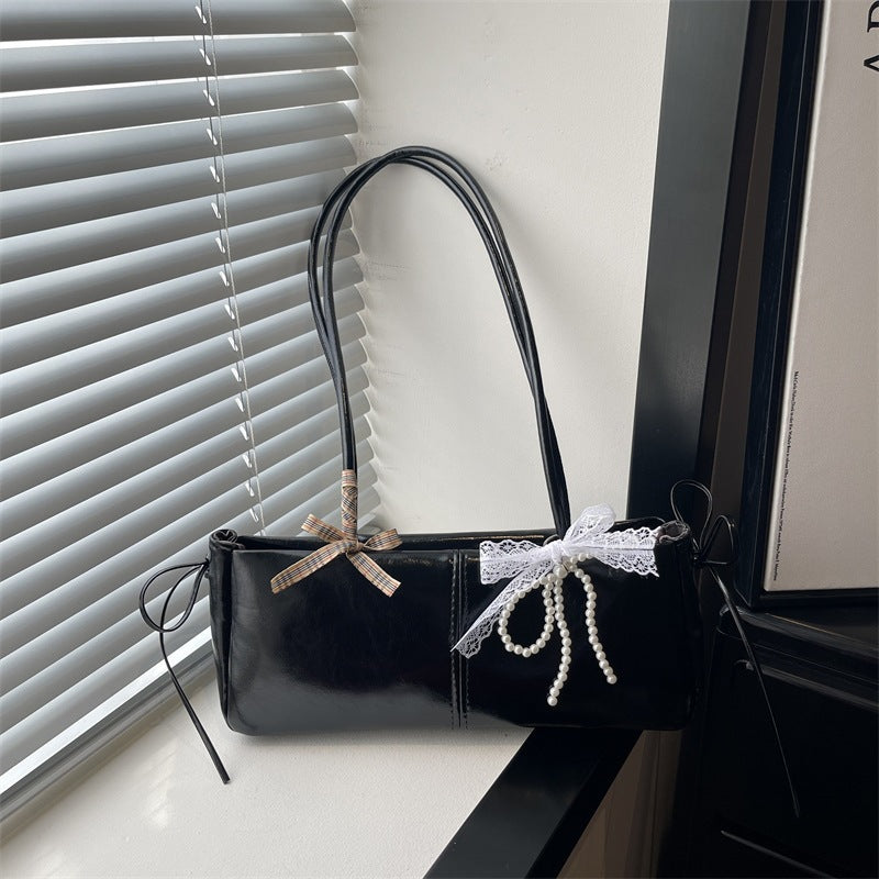 Damen elegante Umhängetasche mit verspielten Akzenten Nord Taschen