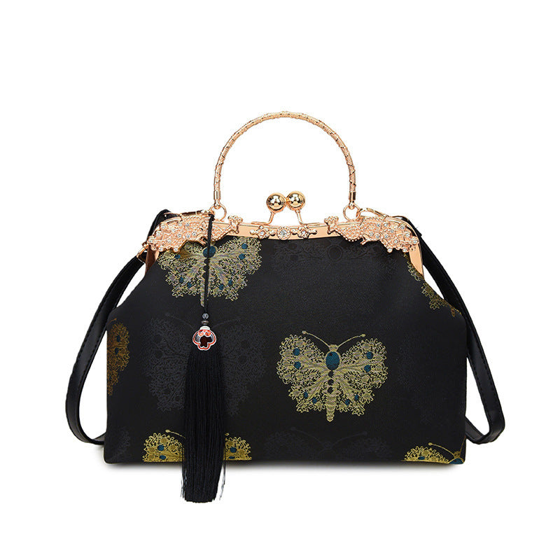 Damen modische Handtasche mit filigranem Schmetterlingsmuster und eleganten Akzenten Nord Taschen