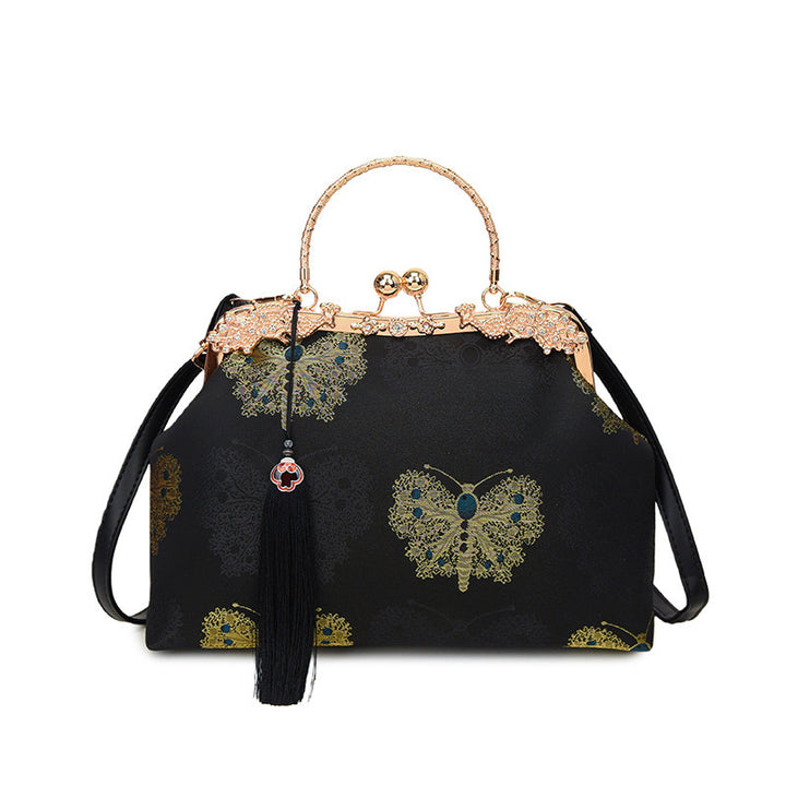 Damen modische Handtasche mit filigranem Schmetterlingsmuster und eleganten Akzenten Nord Taschen