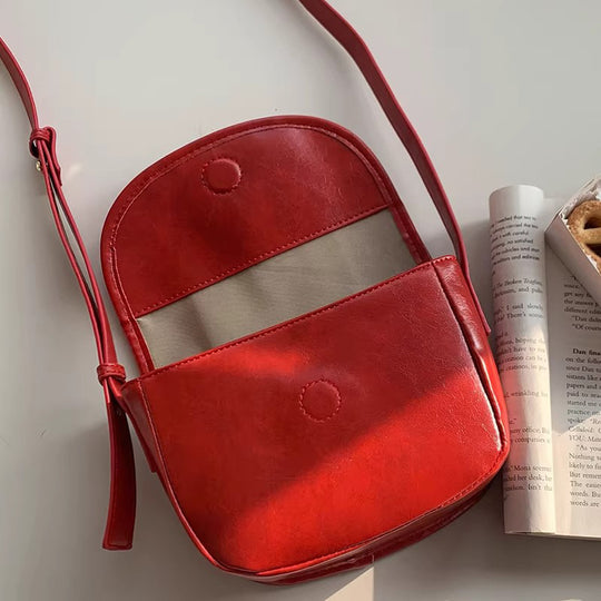 Damen Crossbody-Tasche mit eleganter Klappenöffnung und hochwertiger Lederstruktur Nord Taschen