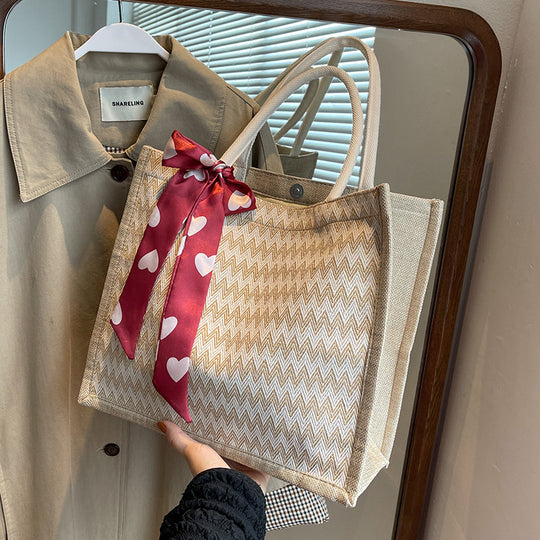 Damen Jute-Shopper mit modernem Wellenmuster und dekorativem Schleifenakzent Nord Taschen