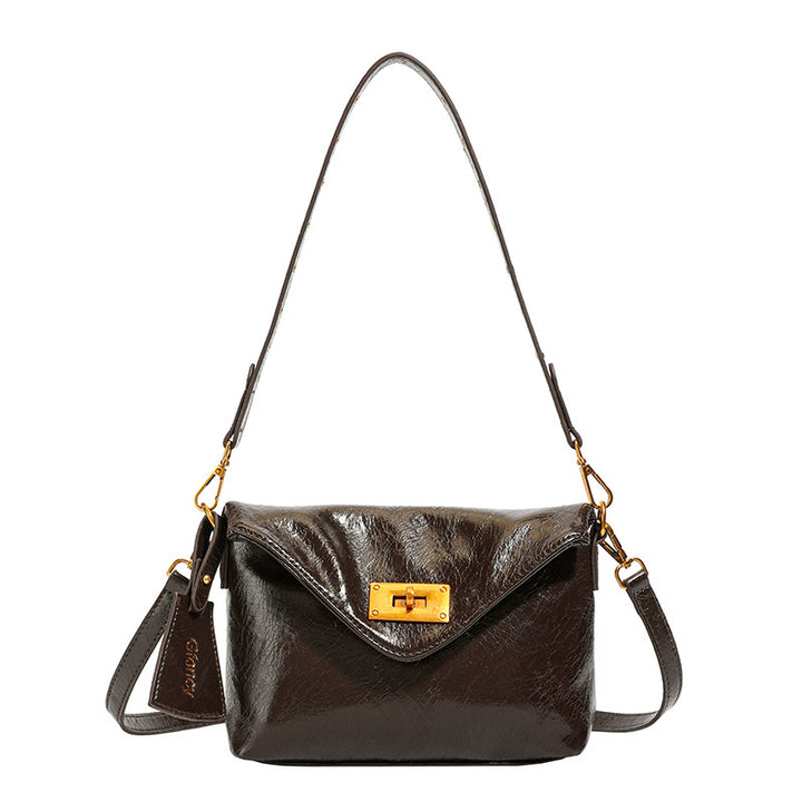 Damen Umhängetasche mit strukturierter Oberfläche und elegantem Drehverschluss Nord Taschen