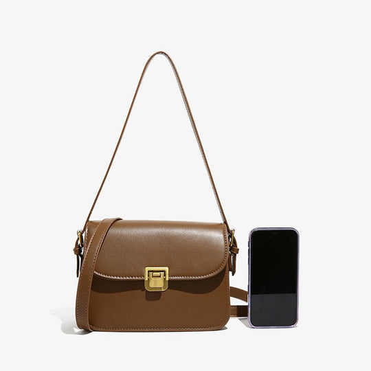 Damen elegante Umhängetasche aus hochwertigem Kunstleder mit stilvollem Verschluss Nord Taschen