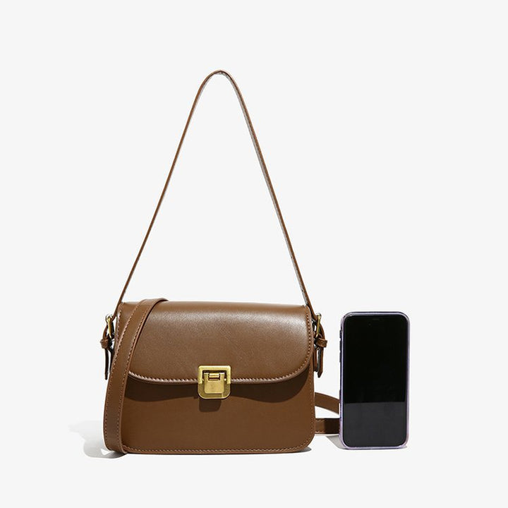Damen elegante Umhängetasche aus hochwertigem Kunstleder mit stilvollem Verschluss Nord Taschen
