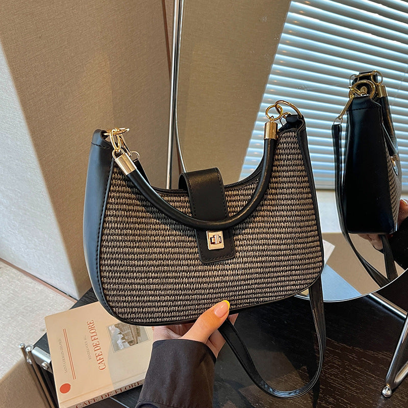 Damen Handtasche mit raffiniertem geflochtenem Design und verspieltem Anhänger Nord Taschen
