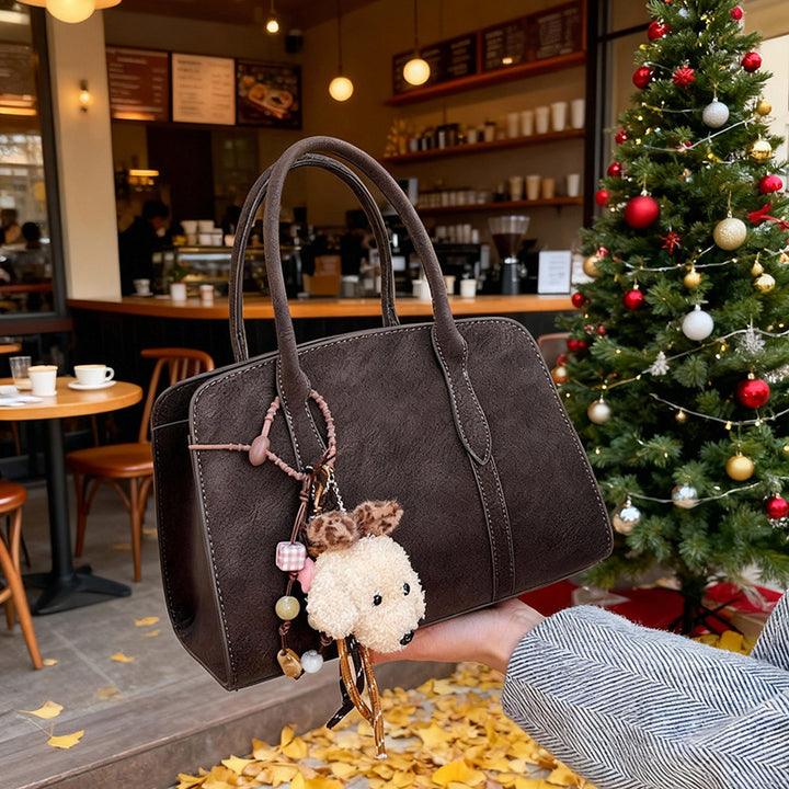 Damen modische Handtasche mit charmantem Anhänger Nord Taschen
