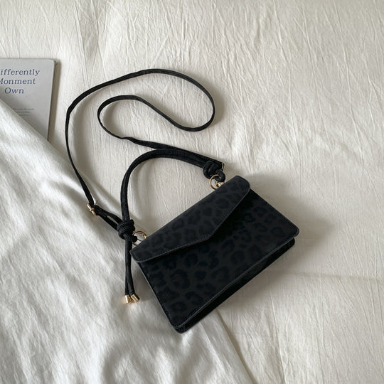 Damen Umhängetasche mit eleganter Leo-Prägung und abnehmbarem Schulterriemen Nord Taschen