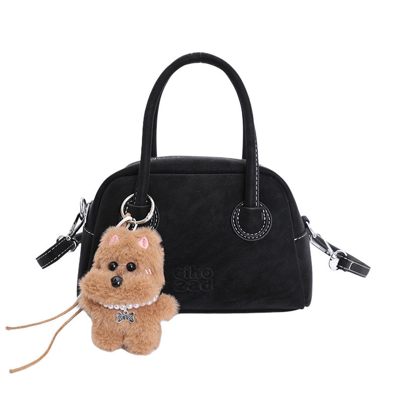 Damen-Handtasche mit verspieltem Tieranhänger Nord Taschen