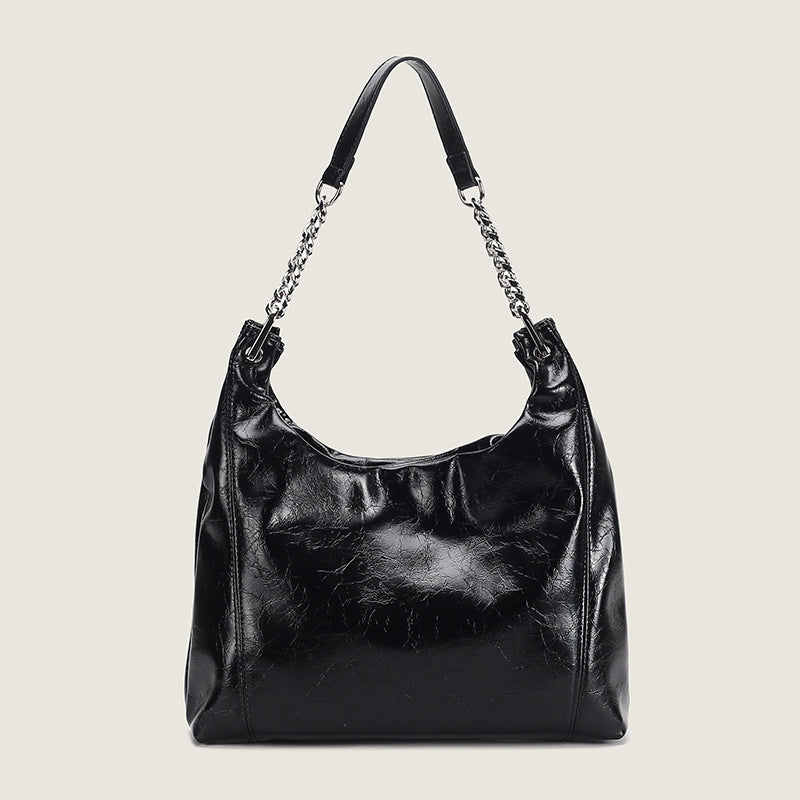 Damen Hobo-Tasche aus glänzendem Kunstleder mit luxuriösen Kettenakzenten Nord Taschen