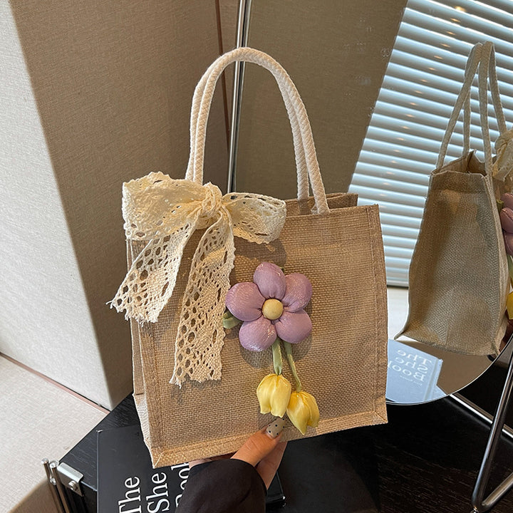 Damen Jute-Handtasche mit floralen Applikationen und dekorativem Schleifen-Design Nord Taschen