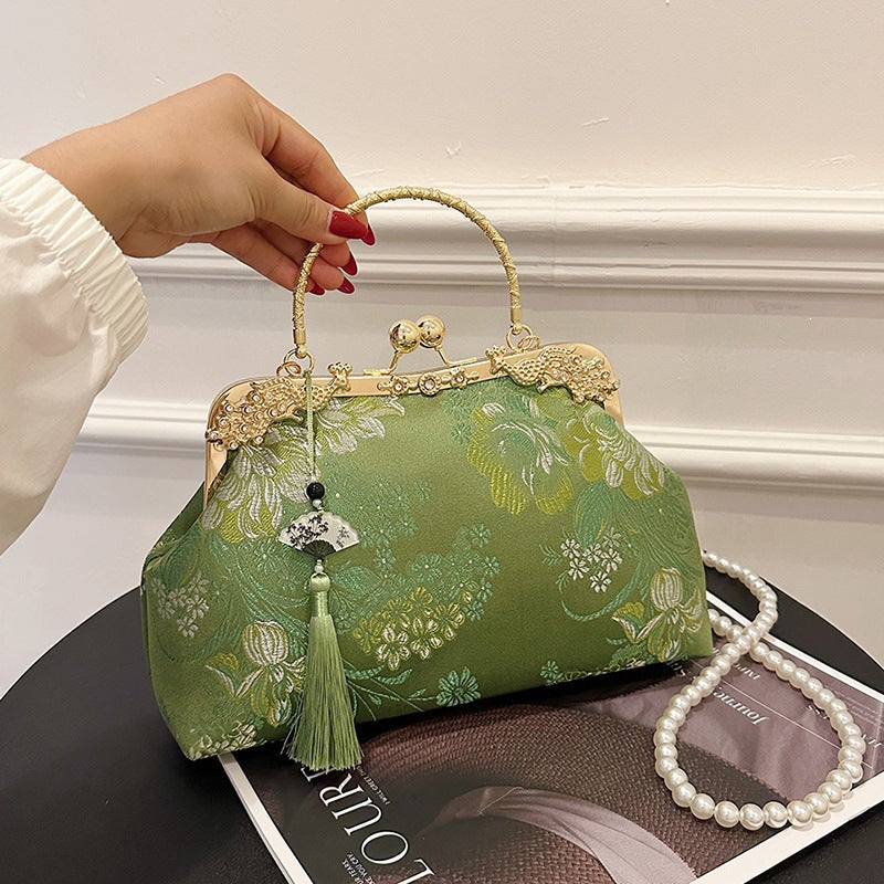 Damen elegante Umhängetasche mit floralem Design und goldenen Akzenten Nord Taschen