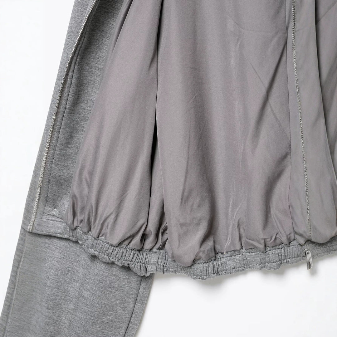 Damen Cropped Kapuzen-Sweatjacke mit Ballonärmeln und Tunnelzug Nord Taschen