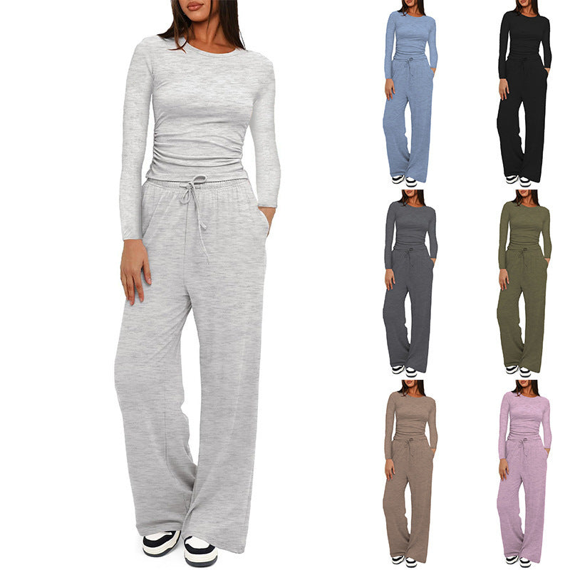 Damen Figurnahe Langarmshirt mit seitlicher Raffung und weiter Tunnelzug-Jogginghose Nord Taschen