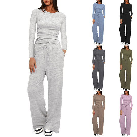 Damen Figurnahe Langarmshirt mit seitlicher Raffung und weiter Tunnelzug-Jogginghose Nord Taschen
