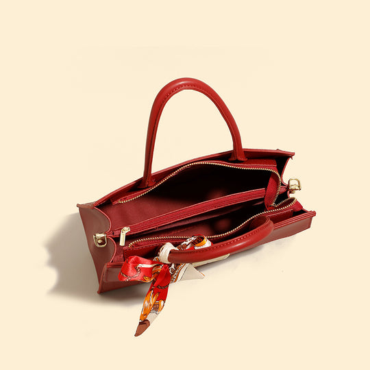 Damen Handtasche mit verstellbarem Schulterriemen und elegantem Schleifenakzent Nord Taschen