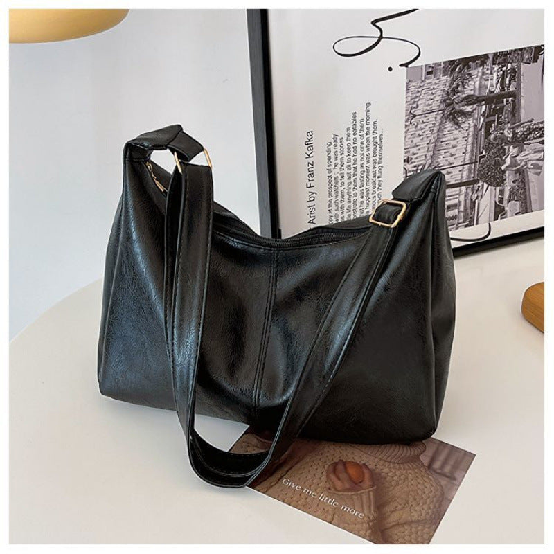 Damen Hobo-Handtasche mit weichem Kunstleder und elegantem Tragegurt Nord Taschen