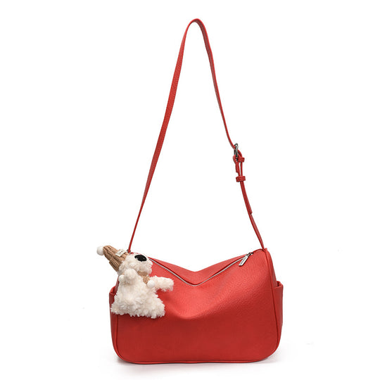 Damen Umhängetasche mit weichem Kunstleder und tierischem Anhänger Nord Taschen
