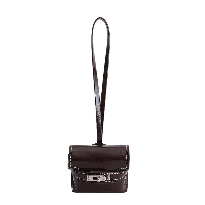 Damen Mini-Handtasche aus hochwertigem Kunstleder mit verspieltem Verschluss Nord Taschen