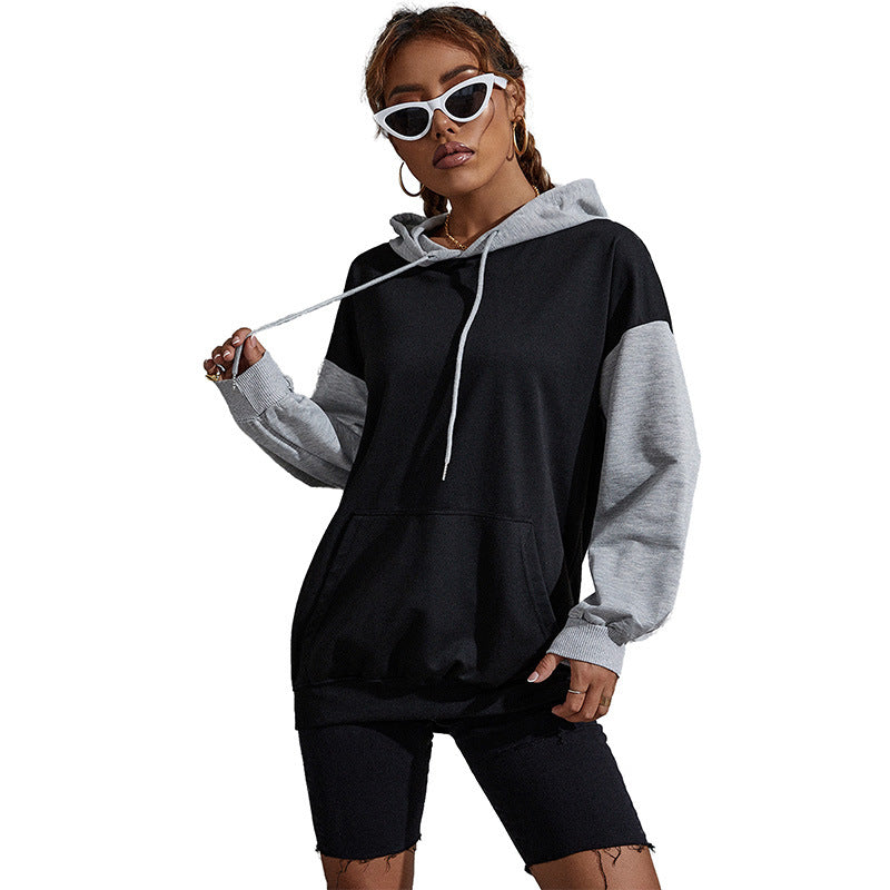 Damen Oversize Sweatshirt mit Kapuze, Kontrastärmeln und Kängurutasche Nord Taschen