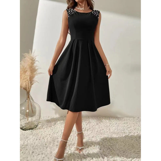 Damen Midi-Kleid mit dekorativen Perlenakzenten und schwingendem Rock