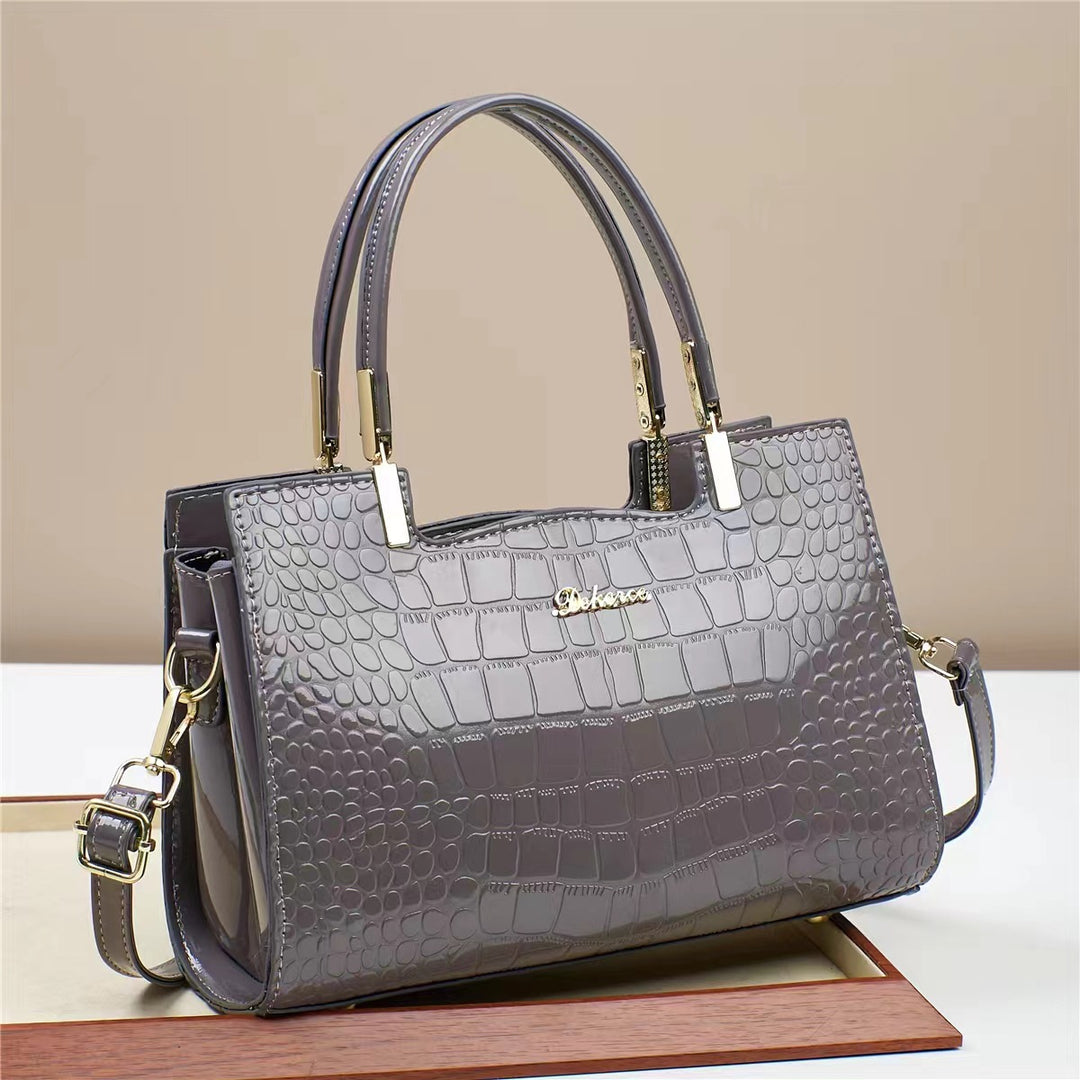Damen Handtasche mit glänzender Krokodilprägung und abnehmbarem Tragegurt Nord Taschen