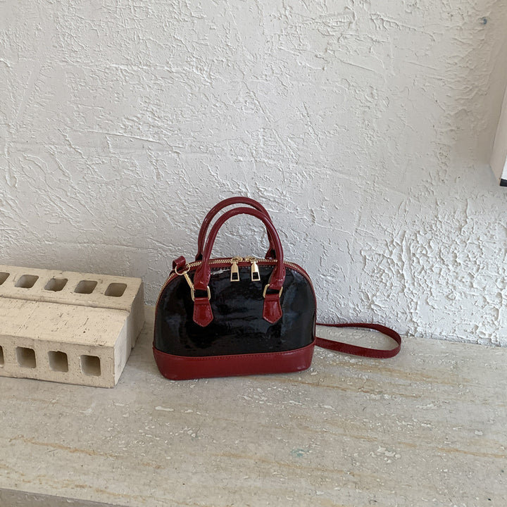 Damen elegante Handtasche im stilvollen Schlangenleder-Look Nord Taschen