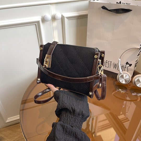 Damen elegante Handtasche mit glänzenden Akzenten und praktischem Reißverschluss Nord Taschen