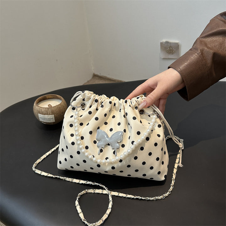 Damen Beuteltasche mit verspieltem Schmetterlingsdesign und perlenverziertem Trageriemen Nord Taschen