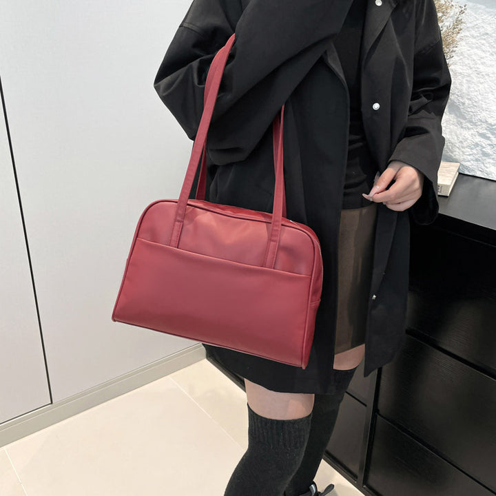 Damen elegante Henkeltasche mit strukturierter Oberfläche und praktischem Innenfach Nord Taschen