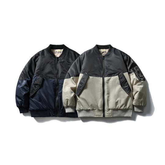 Unisex Kurz geschnittene zweifarbige Nylon‑Bomberjacke mit Utility‑Klappentaschen und Ärmel‑Zipper Nord Taschen
