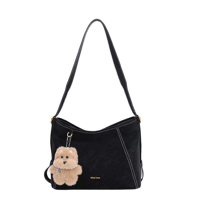 Damen Schultertasche mit verspieltem Tieranhänger und edlem Material Nord Taschen
