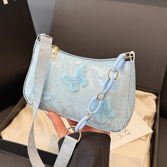 Damen Handtasche mit handgearbeitetem Blumenmuster und modischem Kettenriemen Nord Taschen