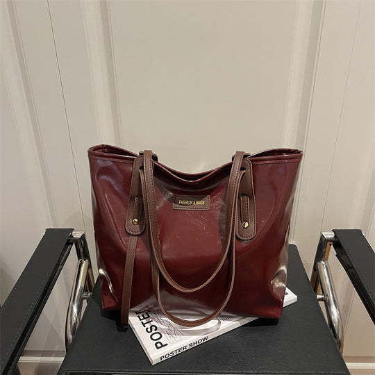 Damen elegante Ledereinkaufstasche mit schimmerndem Finish und abnehmbaren Schulterriemen Nord Taschen