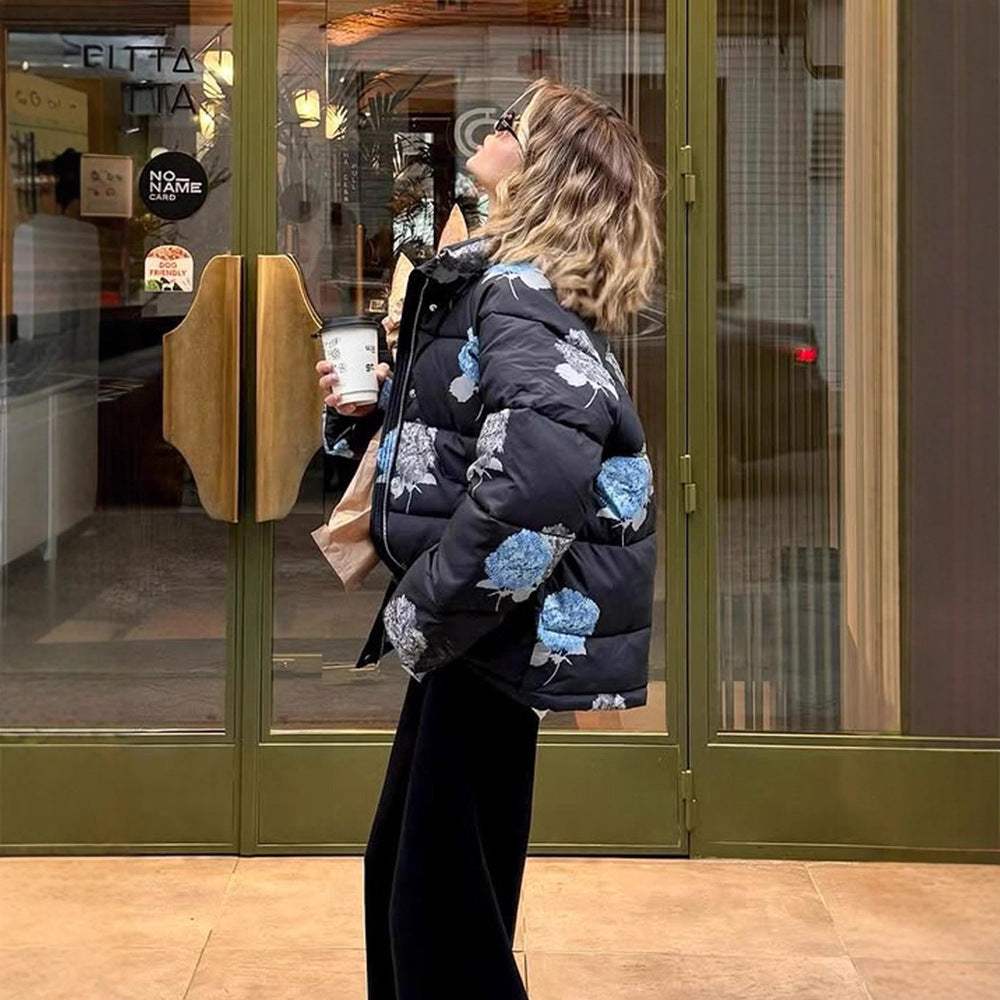 Damen Gepolsterte Oversize-Steppjacke mit Blumenprint und Kapuze Nord Taschen