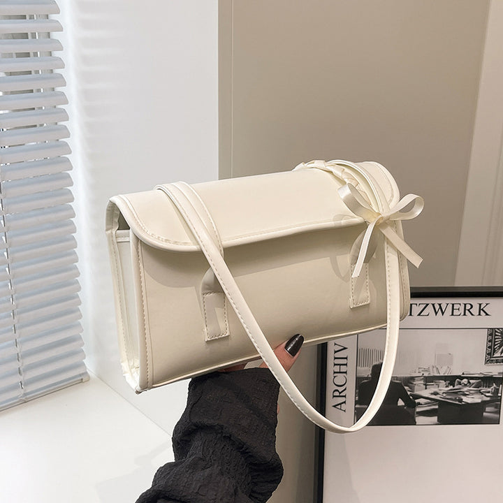 Damen Handtasche aus hochwertigem Kunstleder mit verspieltem Schleifendetail Nord Taschen