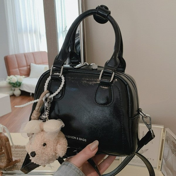 Damen modische Handtasche mit verspieltem Äffchenanhänger Nord Taschen