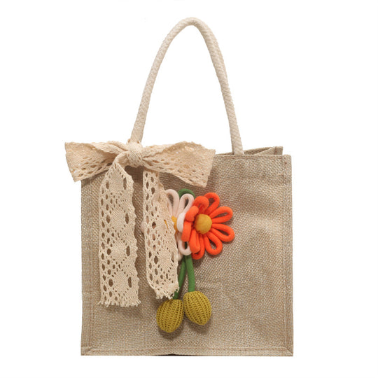 Damen Jute-Tasche mit dekorativer Blumenapplikation und verspieltem Schleifenverschluss Nord Taschen