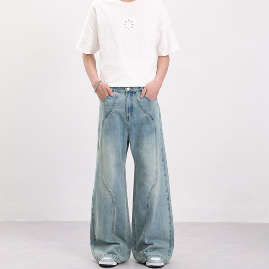 Herren Weit geschnittene Denim-Palazzohose mit geschwungenen Nahtpaneelen und extralangem Saum Nord Taschen