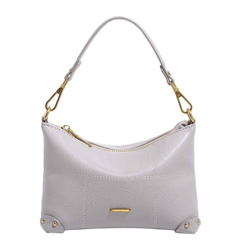 Damen Designer Umhängetasche mit zeitlosem Schnitt und luxuriösen Metallic-Details Nord Taschen