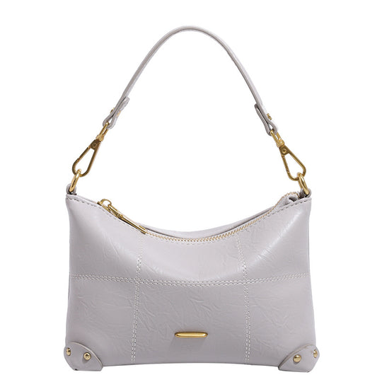 Damen Designer Umhängetasche mit zeitlosem Schnitt und luxuriösen Metallic-Details Nord Taschen