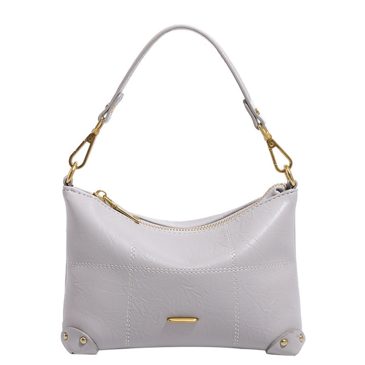 Damen Designer Umhängetasche mit zeitlosem Schnitt und luxuriösen Metallic-Details Nord Taschen