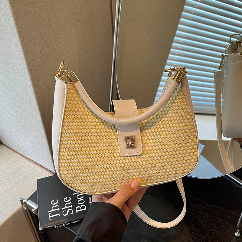 Damen Handtasche mit raffiniertem geflochtenem Design und verspieltem Anhänger Nord Taschen