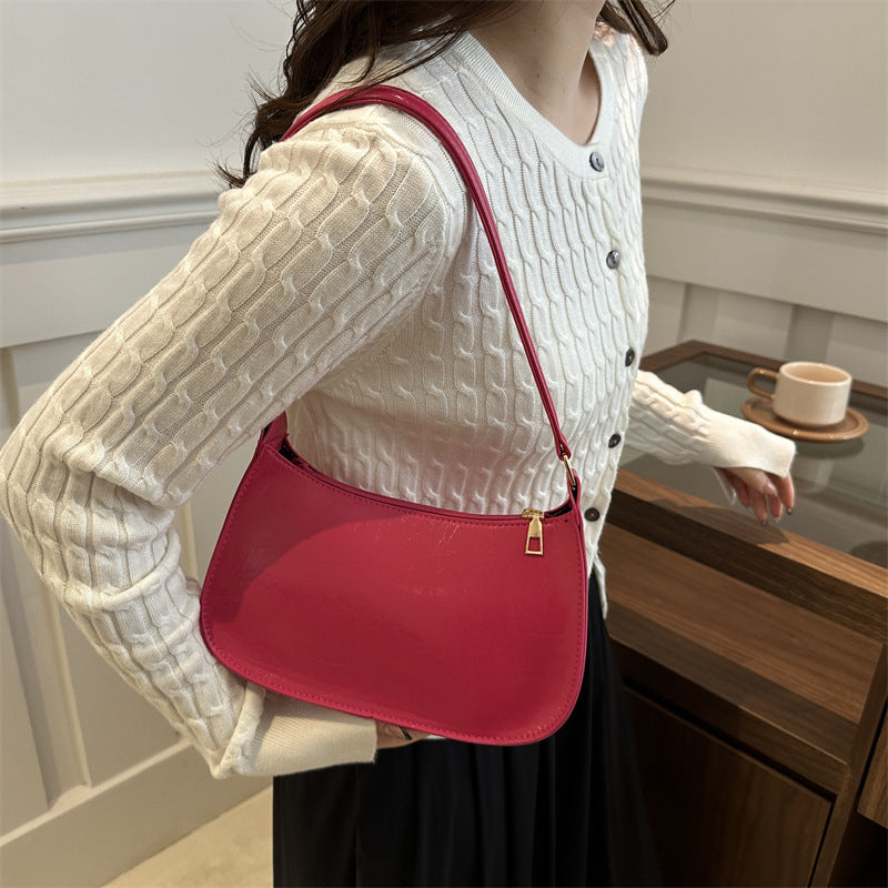 Damen elegante Umhängetasche aus veganem Leder mit minimalistischer Form Nord Taschen