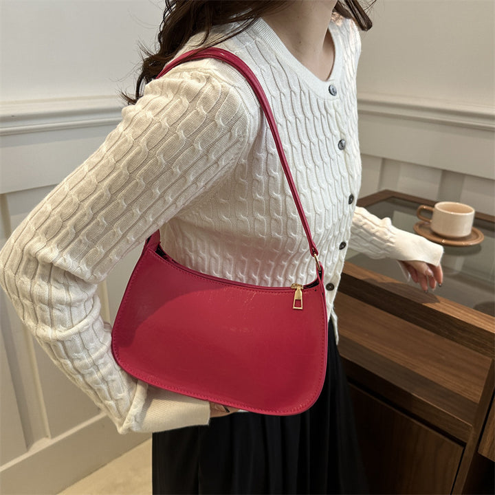 Damen elegante Umhängetasche aus veganem Leder mit minimalistischer Form Nord Taschen