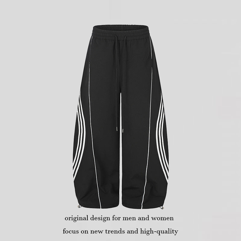 Damen Weite Tech-Material Palazzohose mit Tunnelzugbund, reflektierenden Seitenstreifen und verstellbarem Kordel-Saum Nord Taschen