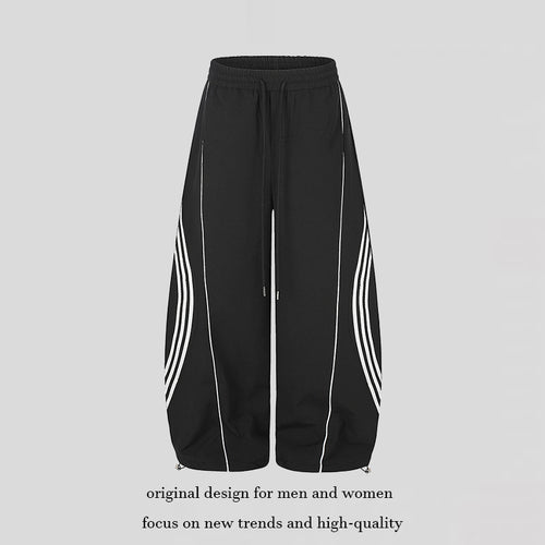 Damen Weite Tech-Material Palazzohose mit Tunnelzugbund, reflektierenden Seitenstreifen und verstellbarem Kordel-Saum Nord Taschen