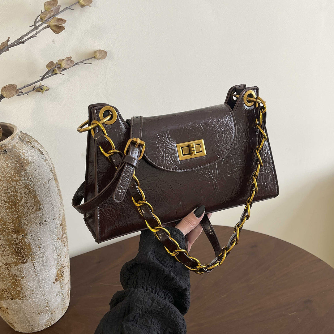 Damen elegante Handtasche mit dekorativem Kettenhenkel Nord Taschen