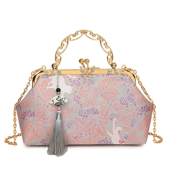 Damen Vintage-Inspirierte Clutch mit Kettenriemen Nord Taschen