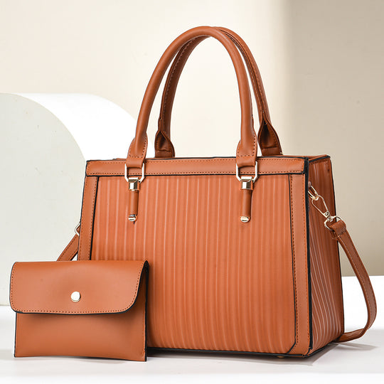 Damen elegante Handtasche mit Streifenstruktur und abnehmbarer Clutch Nord Taschen
