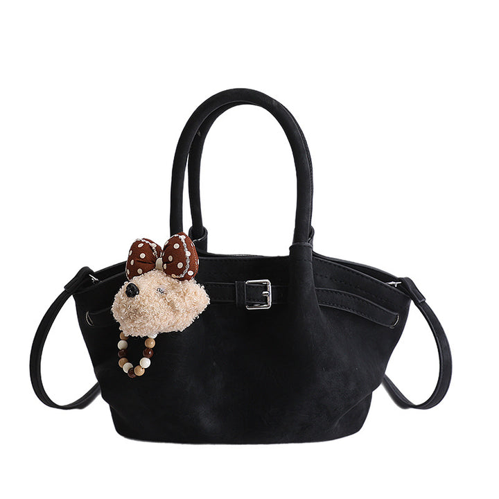 Damen elegante Handtasche mit verspieltem Tieranhänger Nord Taschen